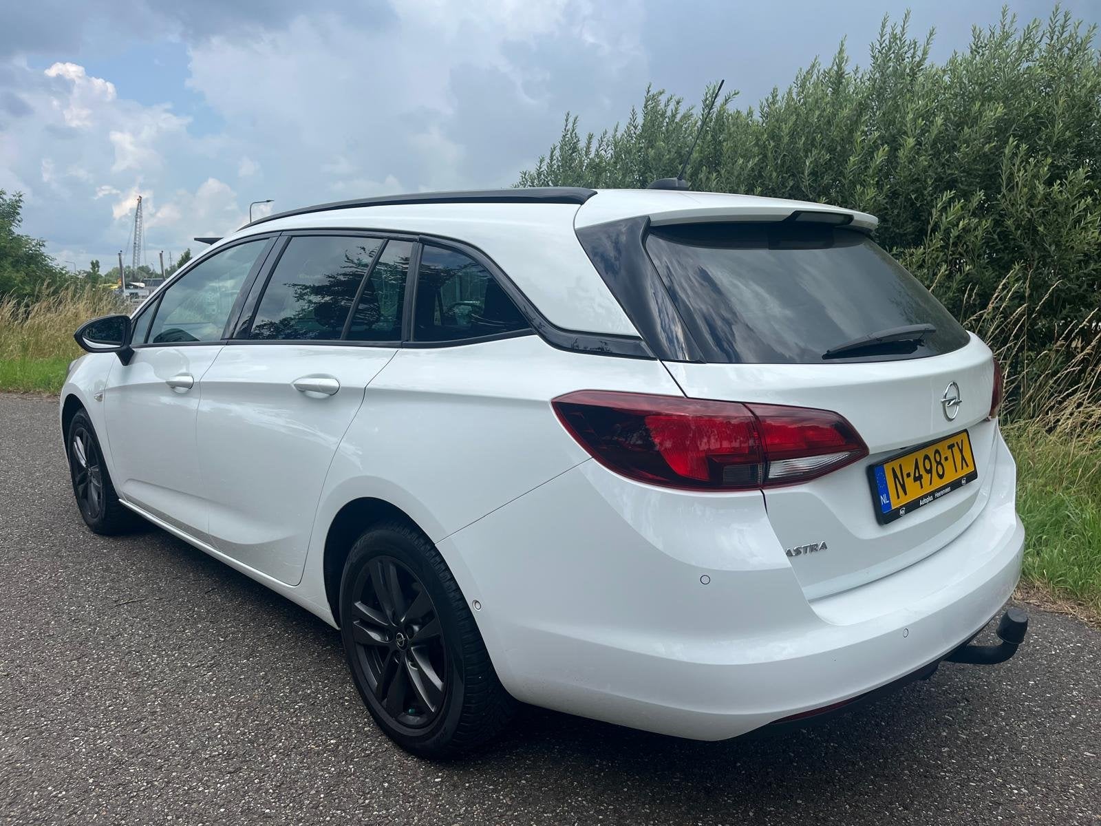 Opel Astra Sports Tourer 1.2 | Clima | Cruise | Navi | Bluet, Voorwielaandrijving, Gebruikt, Euro 6, 1199 cc
