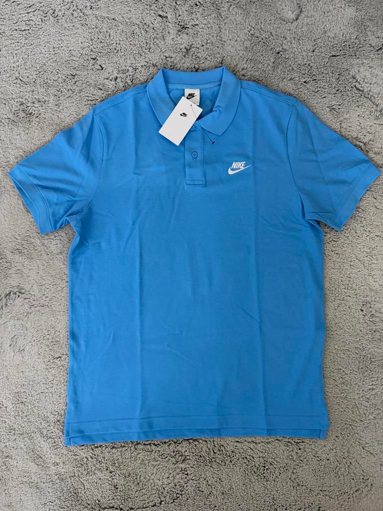 Nike Blauwe Polo Shirt Maat L - Nieuw met labels, Ophalen of Verzenden, Nieuw, Maat 52/54 (L), Blauw