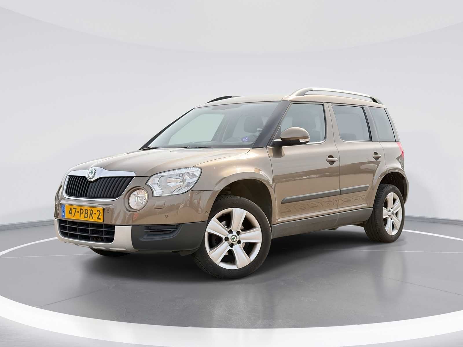 Skoda Yeti 1.2 TSI Elegance 2011 | 47-PBR-2, Auto's, Skoda, Euro 5, Gebruikt, 4 cilinders, Bruin