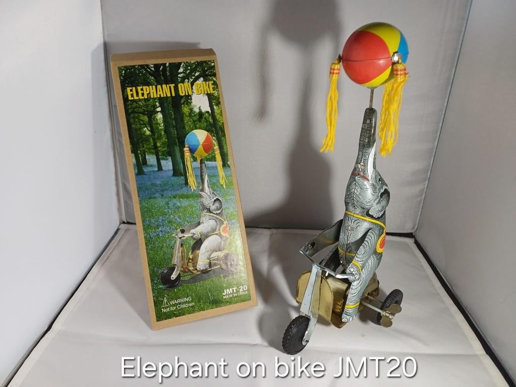 Blikken speelgoed olifant op fiets, Ophalen of Verzenden