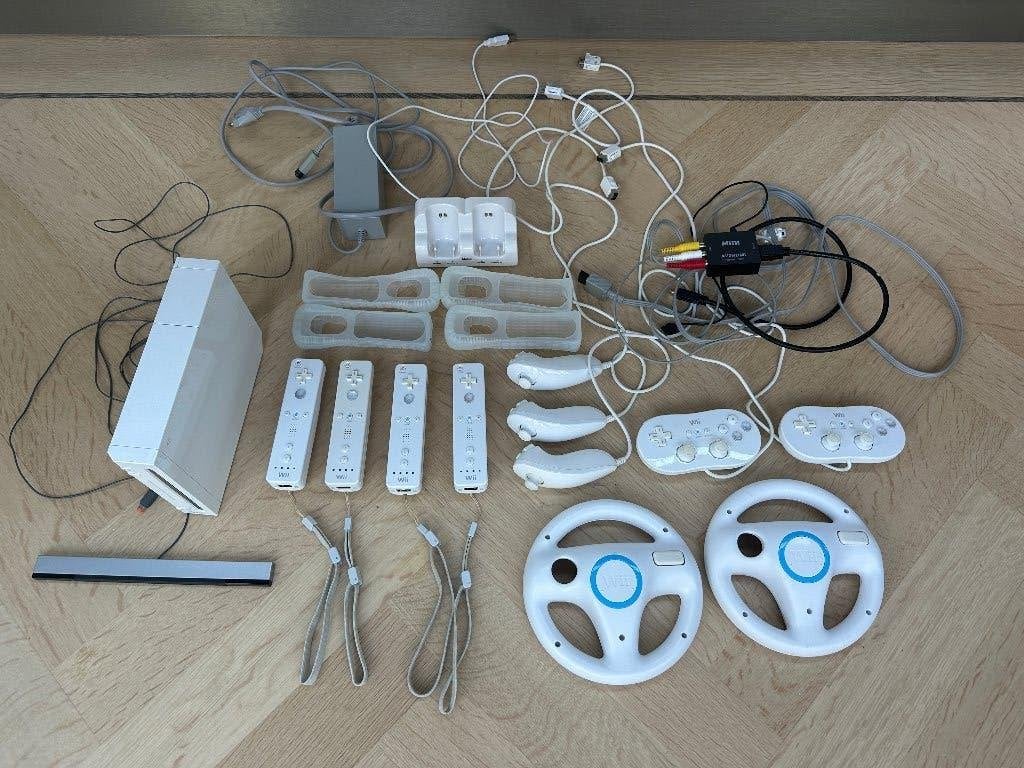 Nintendo Wii complete set, Spelcomputers en Games, Ophalen, Gebruikt, Met 3 controllers of meer, Met stuurtje