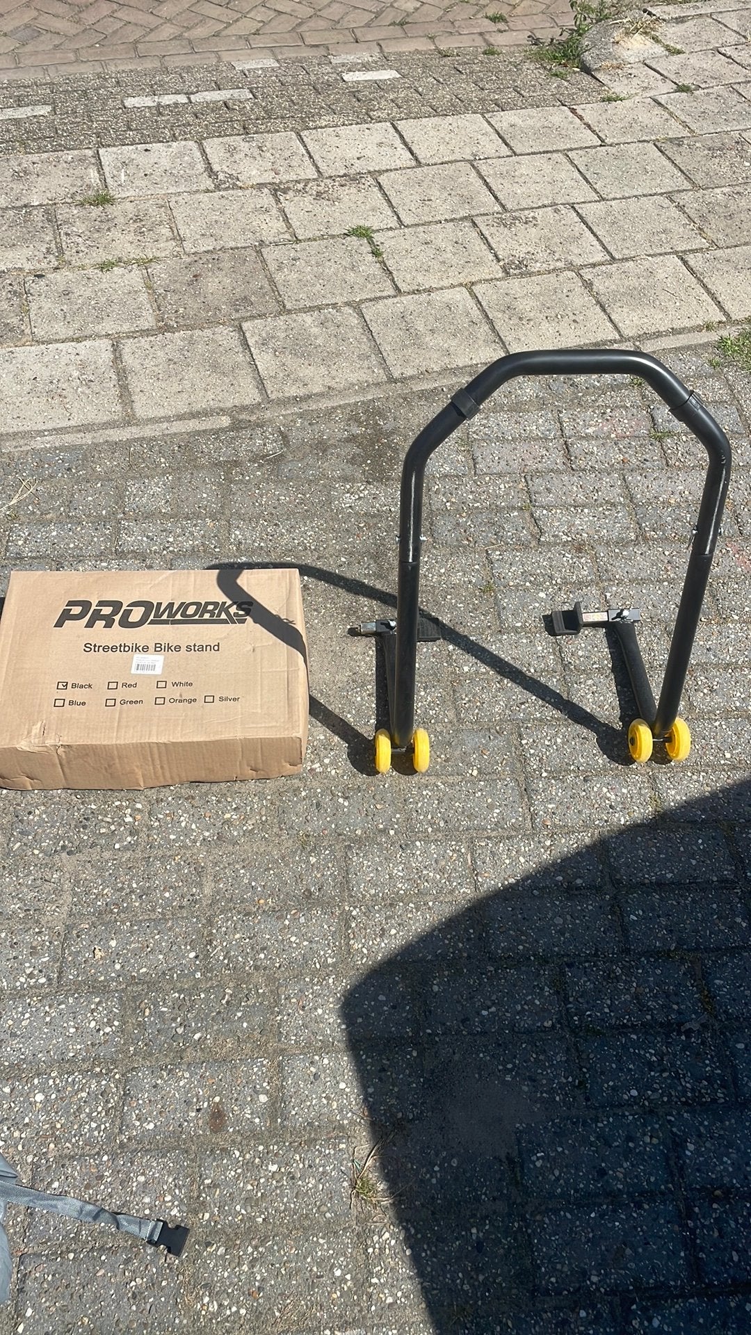 Paddock voor motor, Ophalen