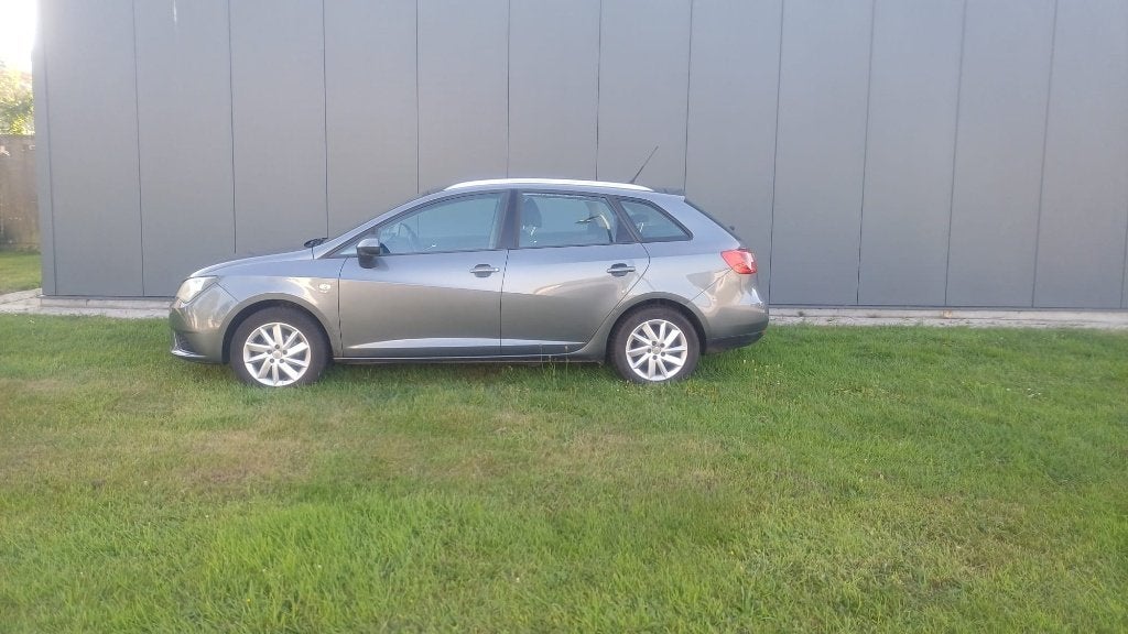 Seat Ibiza ST 1.2 TSI Ruime familieautoTrekhaak Nette staat, Auto's, Euro 5, Stof, Zwart, Stationwagon