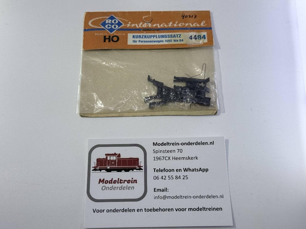 Roco 4484 / 40244 - Setje kortkoppelingen met mechanisme, Hobby en Vrije tijd, Modeltreinen | H0, Zo goed als nieuw, Wagon, Gelijkstroom