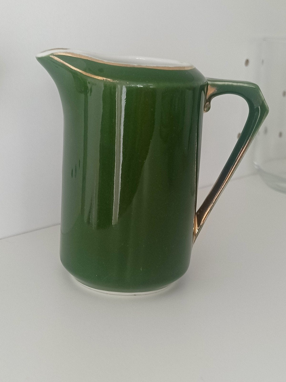 Spm melkkannetje., Ophalen
