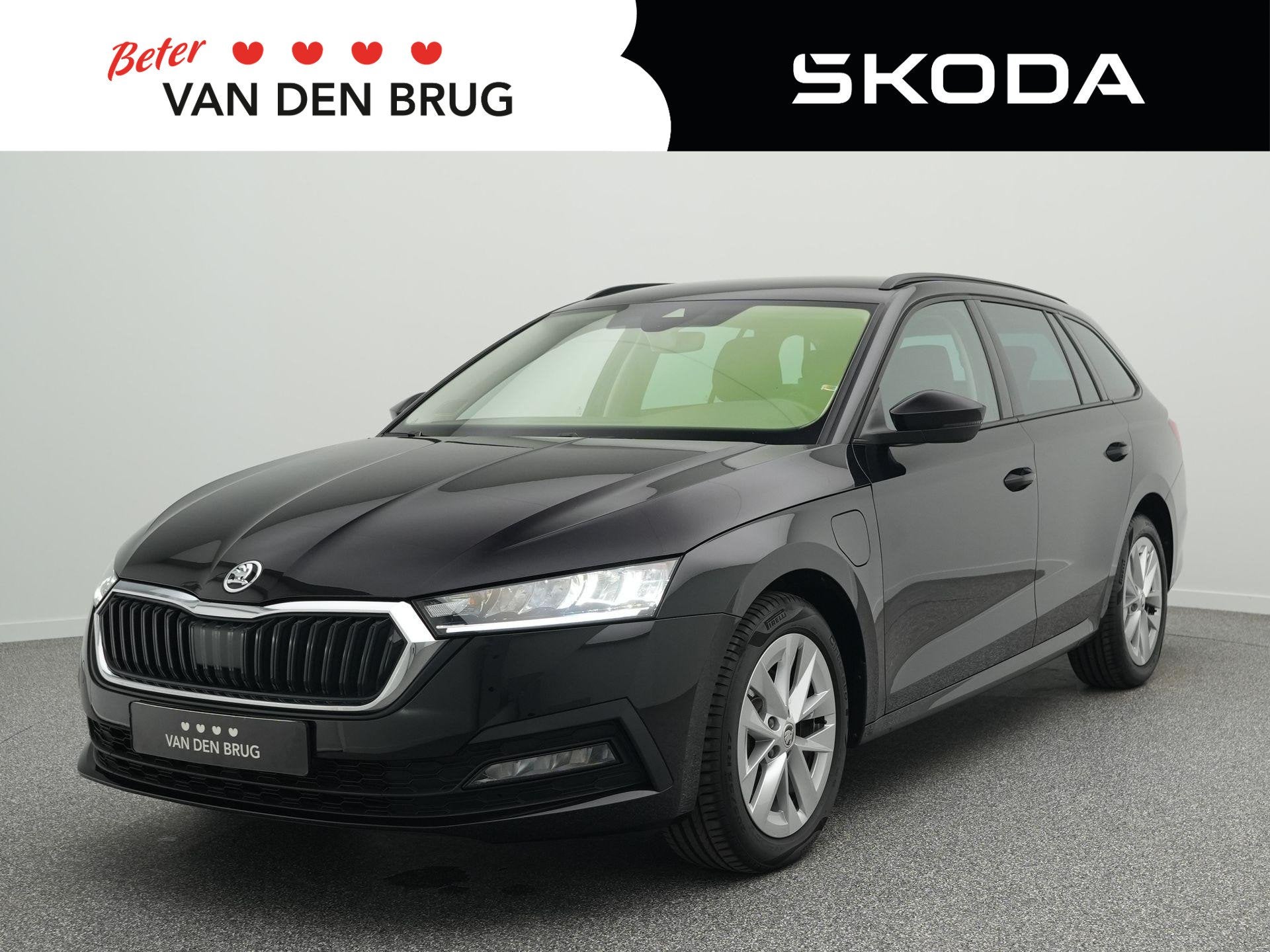 Skoda Octavia Combi 1.4 TSI iV PHEV Business Edition | Trekh, Auto's, Stof, Gebruikt, Euro 6, Zwart