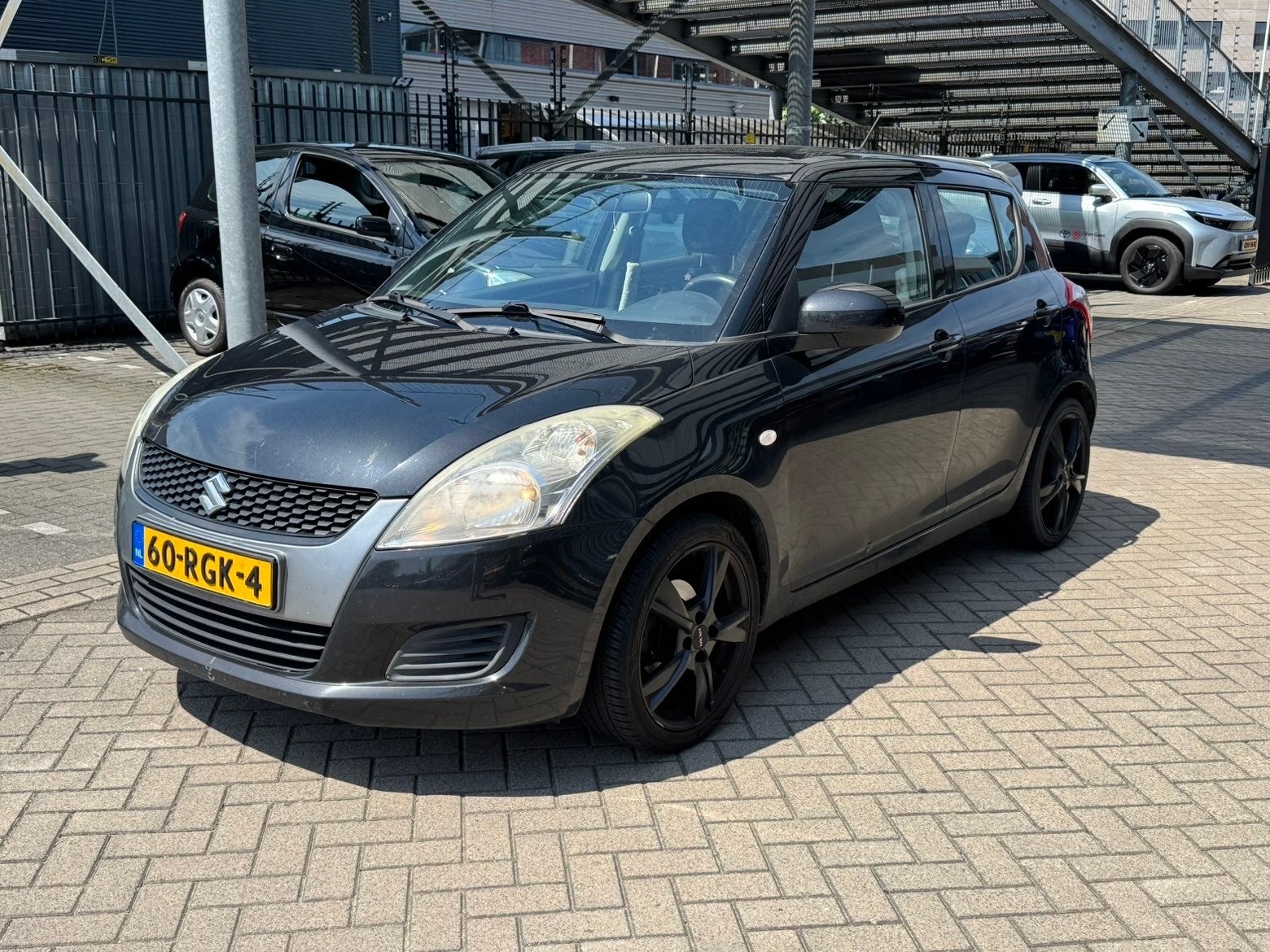 Suzuki Swift 1.2 5-D 2011 Zwart, Auto's, Voorwielaandrijving, 4 cilinders, 400 kg, Origineel Nederlands