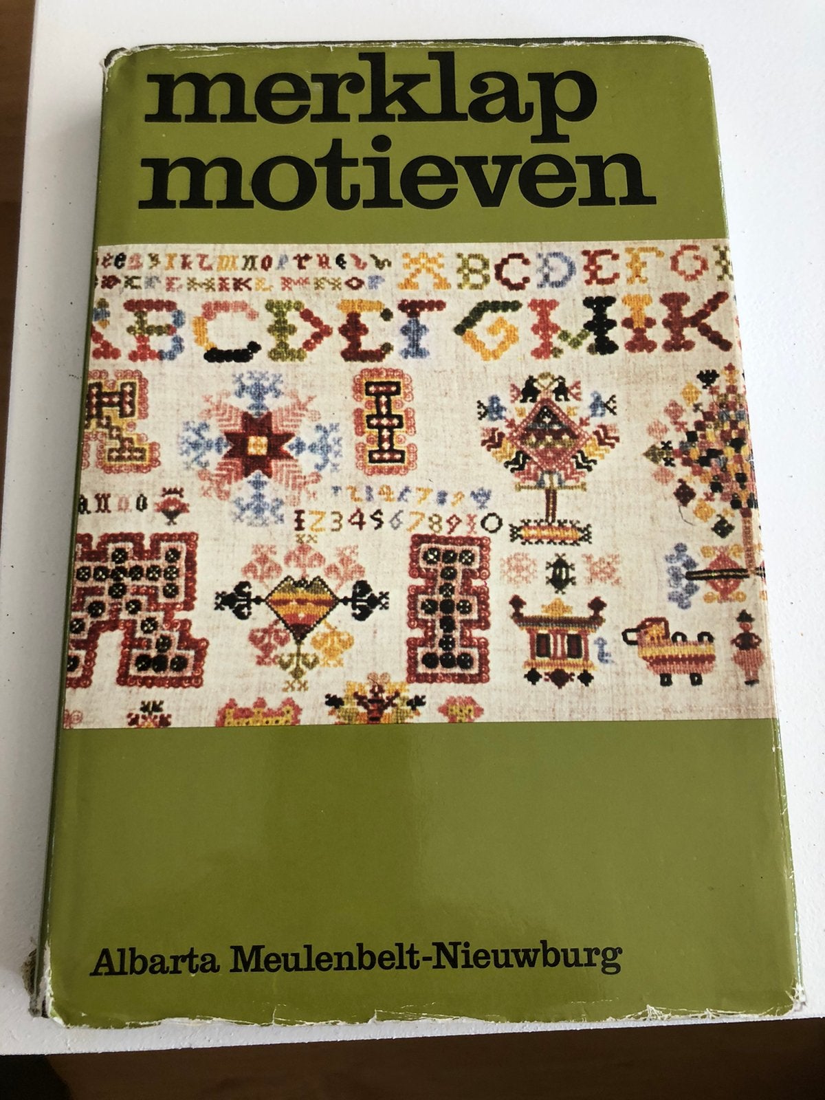 Kruissteekboek merklapmotieven, Ophalen of Verzenden, Zo goed als nieuw, Patroon