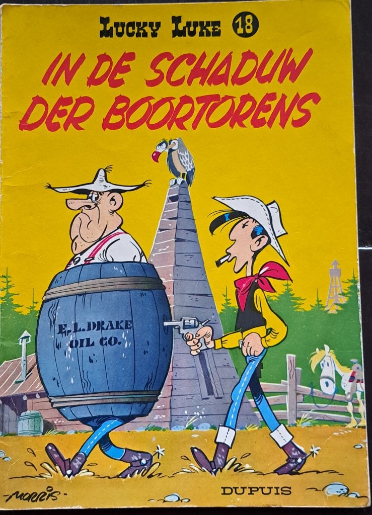 Lucky Luke (18) - In de schaduw der boortorens, Eén stripboek, Ophalen of Verzenden, Gelezen