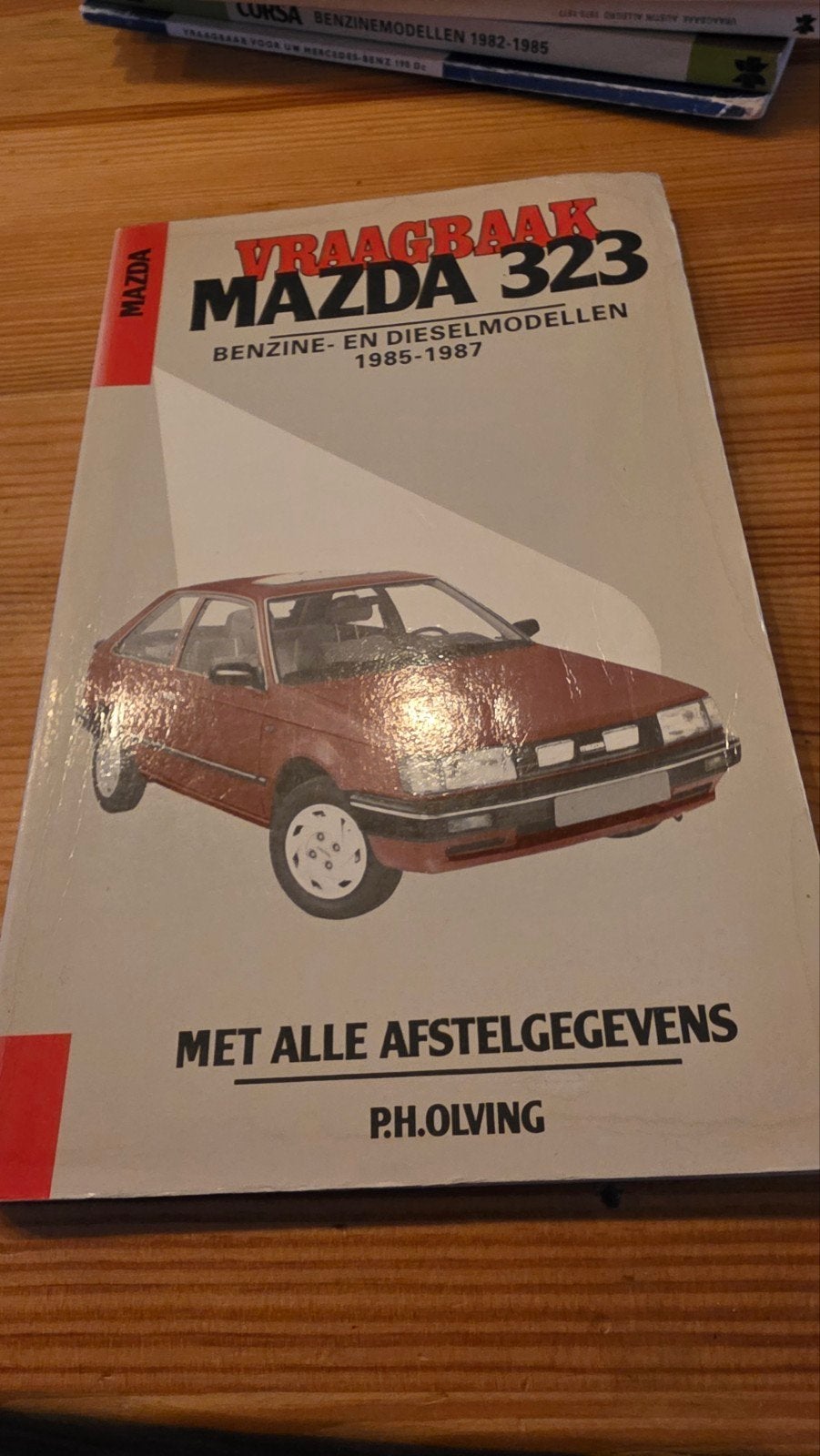 Vraagbaak Mazda 323 Benzine- en Dieselmodellen 1985-1987, Ophalen of Verzenden, Gelezen, Mazda, P.H. Olving