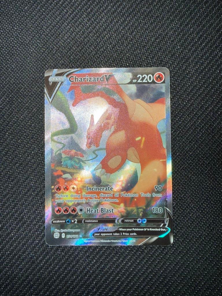 Pokemon charizard v 154/172, Ophalen of Verzenden, Zo goed als nieuw