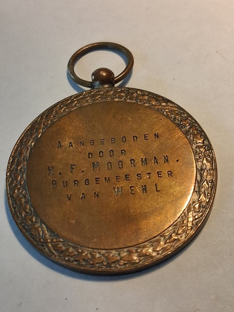 Te koop: gedenk/beloningspenning HF Moorman Wehl, Postzegels en Munten, Penningen en Medailles, Ophalen, Overige materialen, Nederland