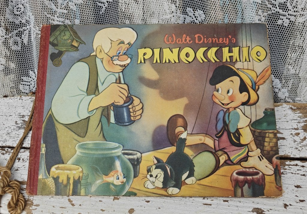 Pinocchio boek met plaatjes Compleet. Verzamelen Walt Disney, Ophalen of Verzenden, Gelezen, Walt Disney, Plaatjesalbum