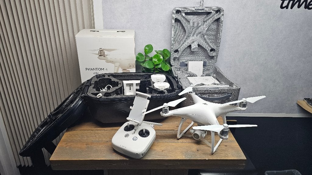DJI Phantom 4 4K drone + 2 accu's + rugtas + Charging Hub, Gebruikt, Cameradrone, Return to Home, 1 tot 5 kilometer