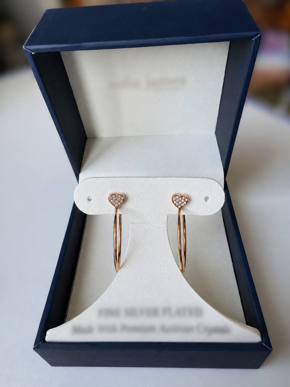 Prachtige Fossil oorbellen in roségoudkleur, Ophalen of Verzenden, Zo goed als nieuw, Goud, Overige materialen