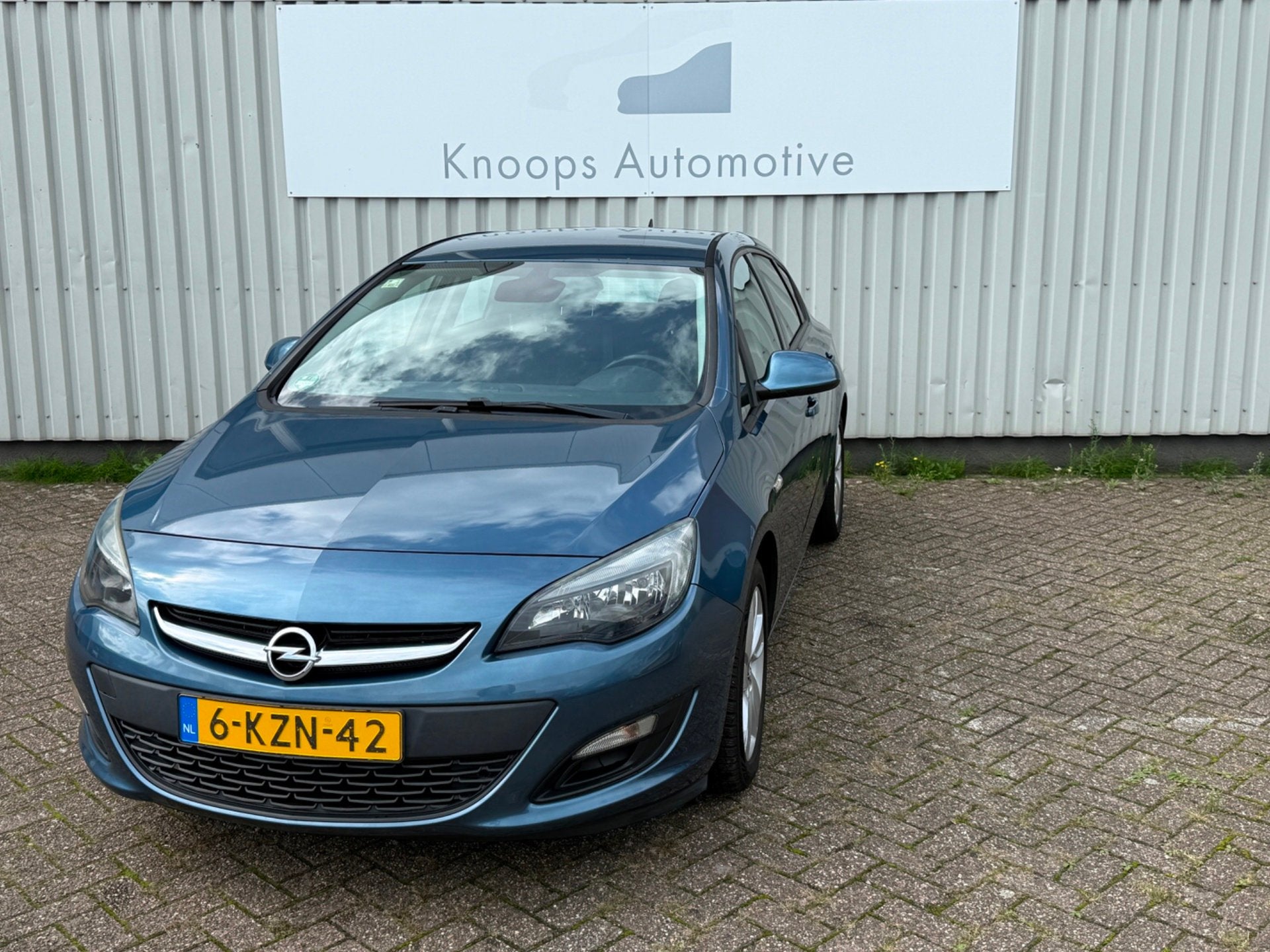 Opel Astra 1.4 Business + 5drs Navigatie, Auto's, Voorwielaandrijving, Euro 5, Gebruikt, 4 cilinders