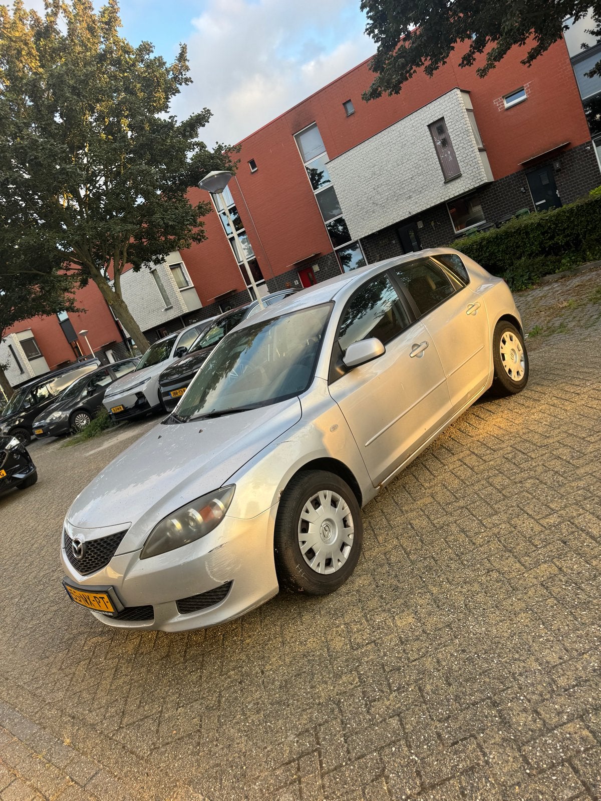 Mazda 3 1.6 Sport Touring AUT 2004 Grijs, Auto's, Mazda, 4 cilinders, Origineel Nederlands, 1200 kg, Particulier