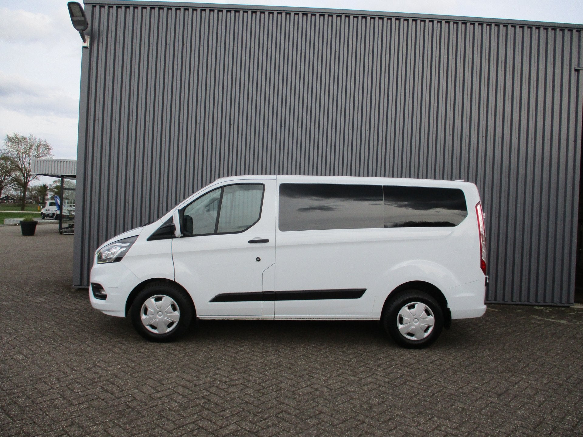 Ford Transit Custom 320 2.0 TDCI Trend Personenbus 9 Persoon, Voorwielaandrijving, Stof, Gebruikt, Wit