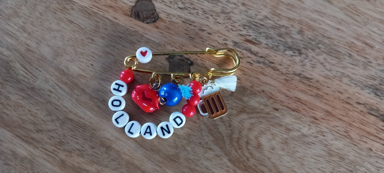Holland speld Broche met Bedels, Overige materialen, 4 tot 7 cm, Nieuw, Ophalen of Verzenden