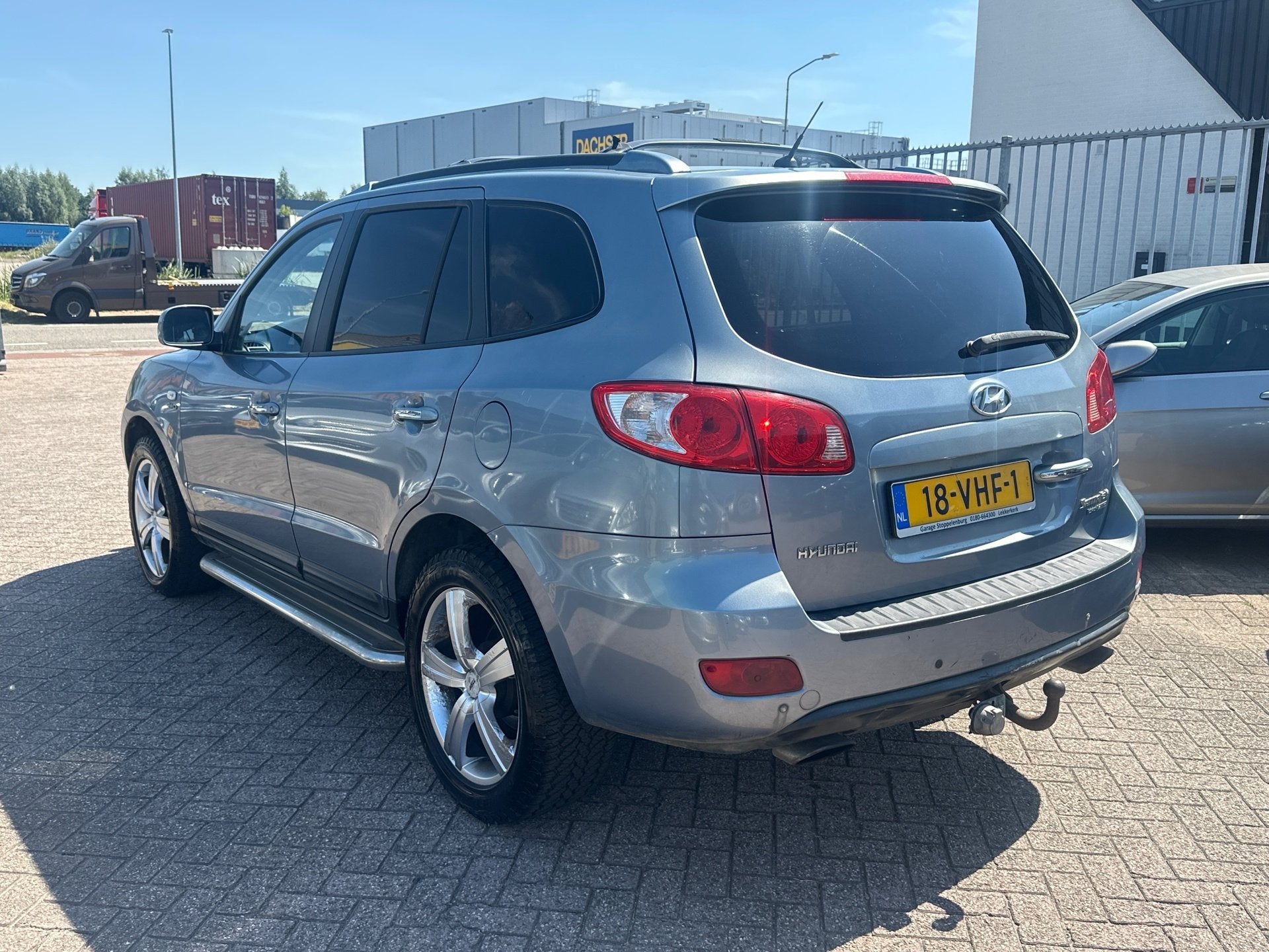 Hyundai Santa Fe 2.2 CRDi VGT StyleVersion Automaat | Grijs, Auto's, Automaat, Stoelverwarming, Gebruikt, 4 cilinders