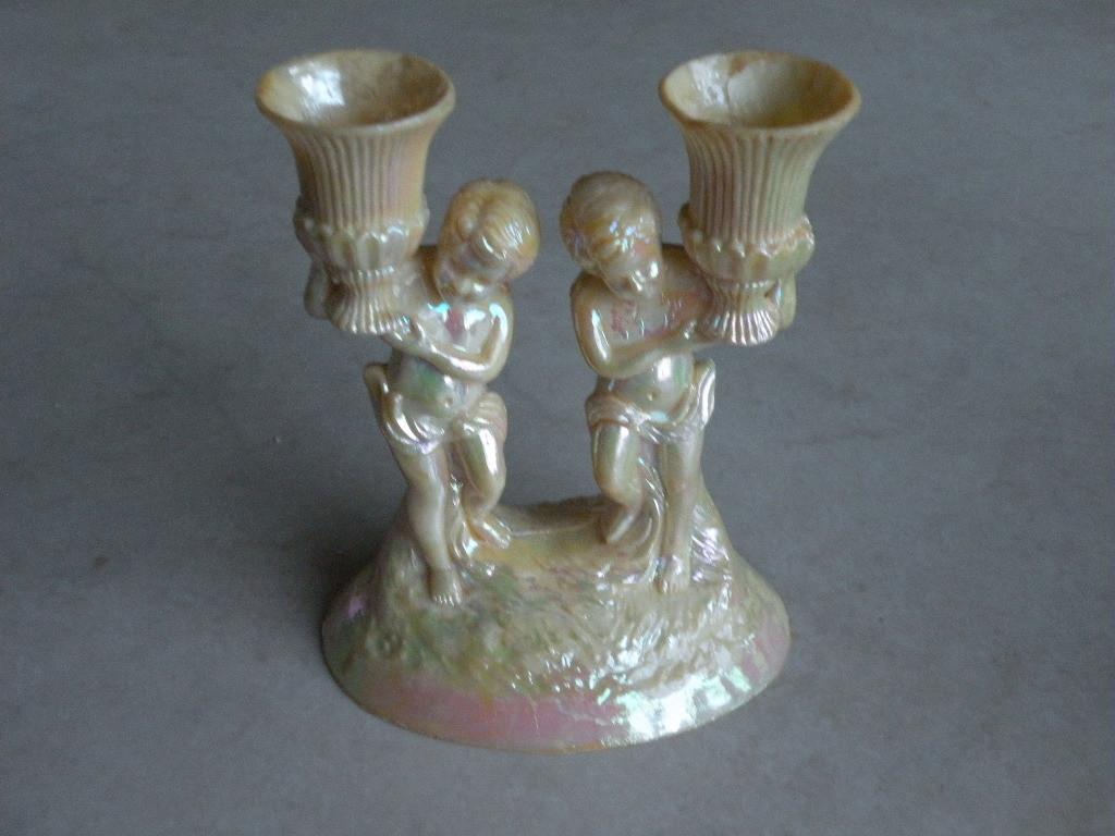 Kandelaar met engeltjes., Huis en Inrichting, Woonaccessoires | Kandelaars en Kaarsen, Kunststof, Ophalen of Verzenden, Zo goed als nieuw