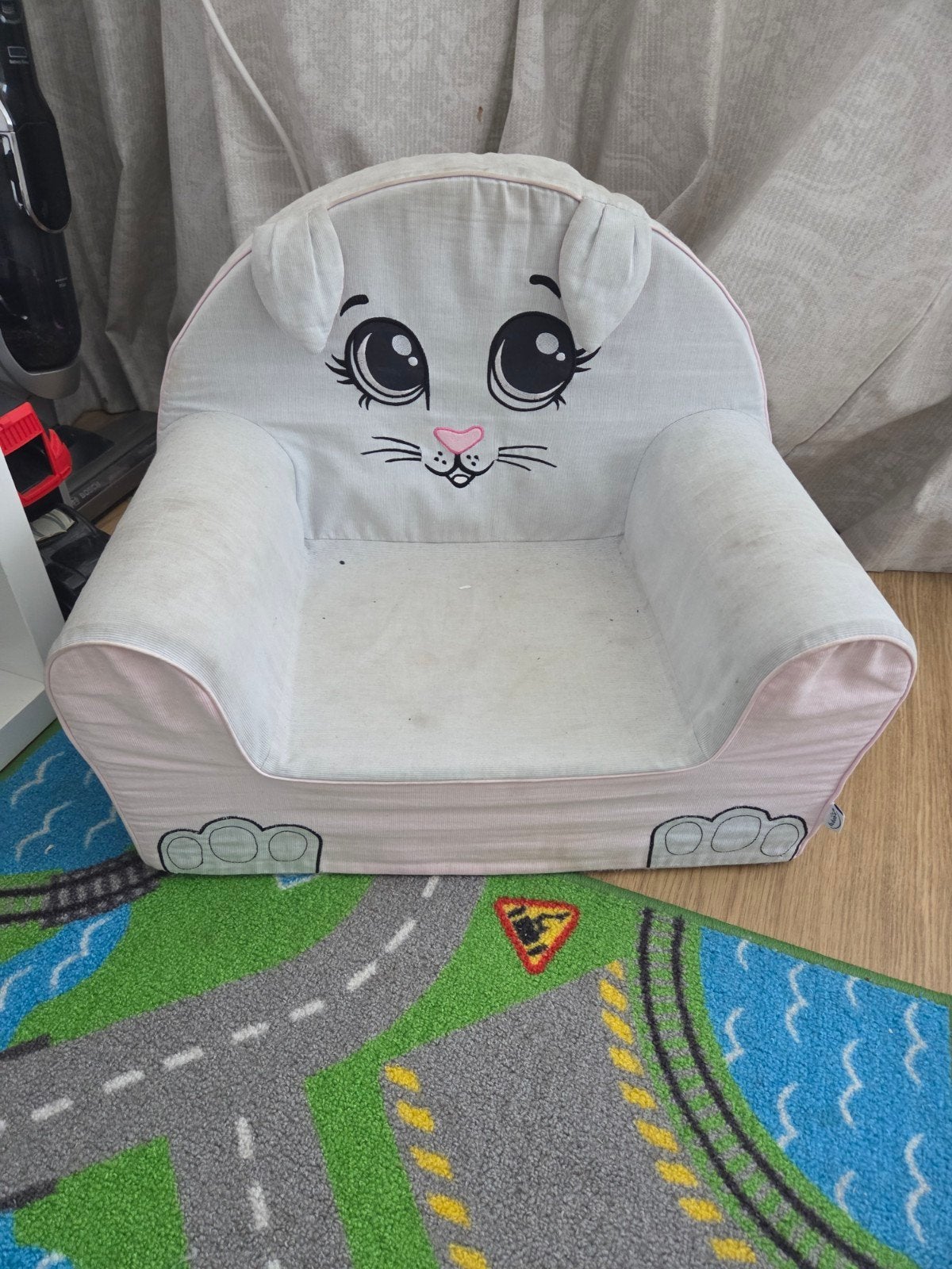 Gratis kinderstoeltje met kattengezicht, Ophalen