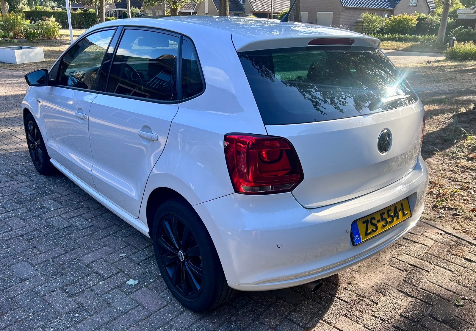 Volkswagen Polo 1.2 TSI|Panoramadak|CarPlay|Stoelverwarming, Voorwielaandrijving, 40 €/maand, Zwart, 4 cilinders