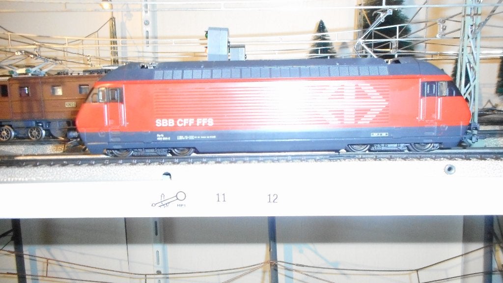 MARKLIN 3460 Zwitserse design loc 460 Re 4/4 VI SBB logo, Wisselstroom, Locomotief, Ophalen of Verzenden, Zo goed als nieuw