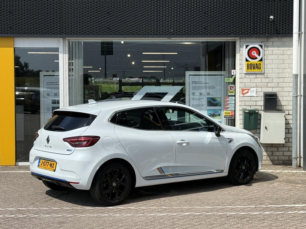 Renault Clio 1.6 E-Tech Hybrid 140 Serie Limitee E-TECH | NA, Auto's, Gebruikt, 4 cilinders, Met garantie (alle), Wit