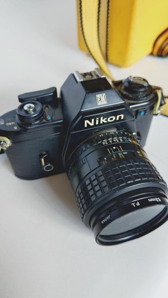 Nikon EM plus 100mm, 50mm, 35mm fish eye, Audio, Tv en Foto, Fotocamera's Analoog, Ophalen of Verzenden, Spiegelreflex, Nikon