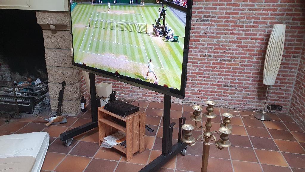 TV meubel 2-zijdig verrijdbaar  zwart 120 breed, Ophalen, 100 tot 150 cm, Mat zwart.  Metaal . Diepte betreft voet, Zo goed als nieuw