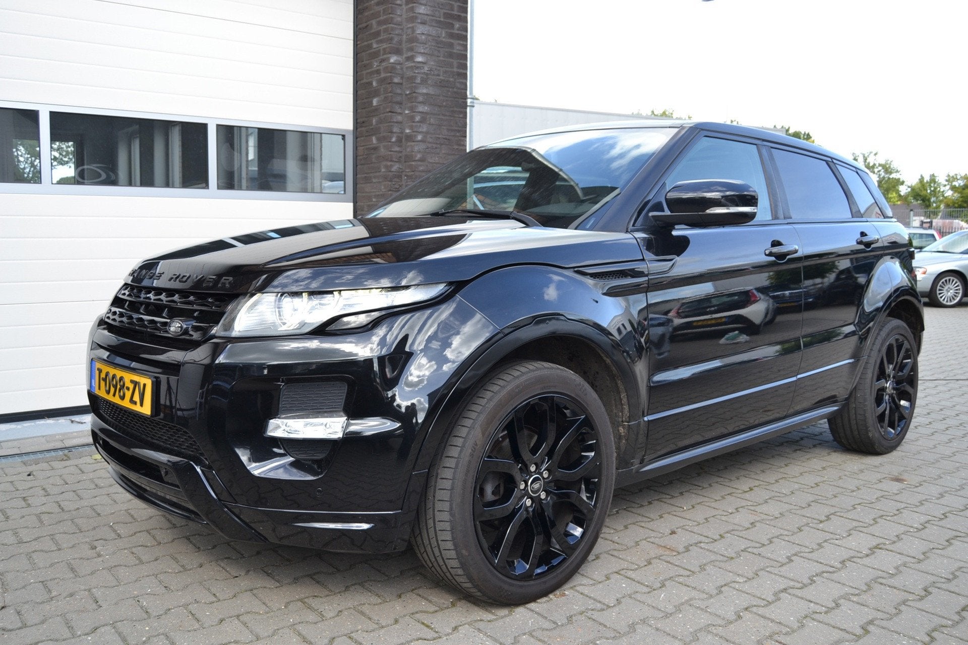 Land Rover Range Rover Evoque 2.0 Si 4WD Prestige, Auto's, Automaat, Euro 5, Zwart, 4 cilinders