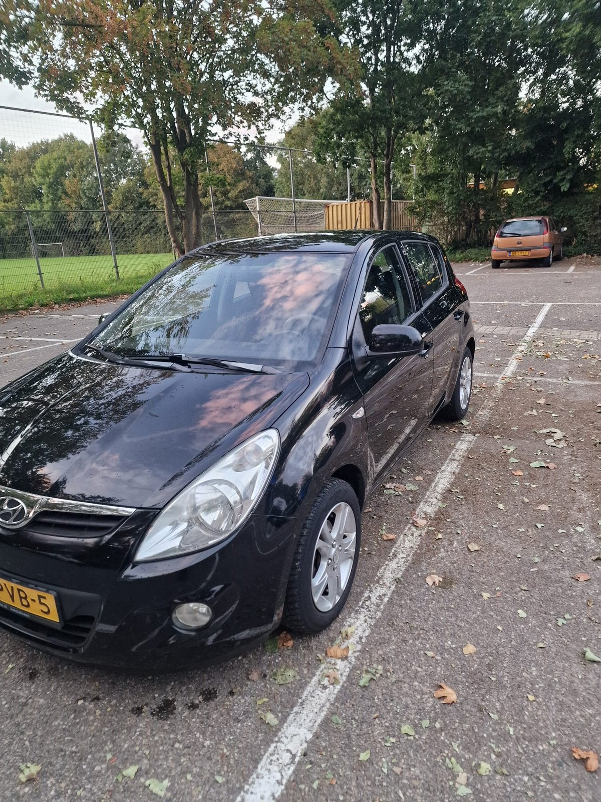 Hyundai i20 1.2 5-DRS 2011 Zwart, Auto's, 450 kg, 31 €/maand, 4 cilinders, Zwart