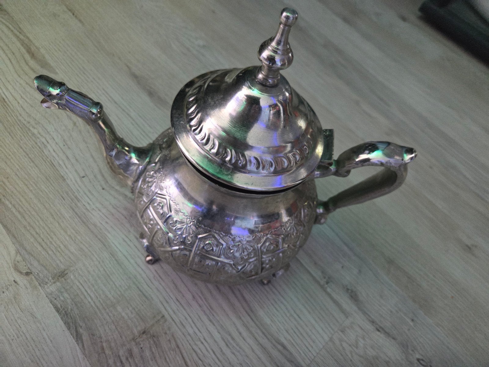 Marokkaanse theepot met gazellen logo, Ophalen