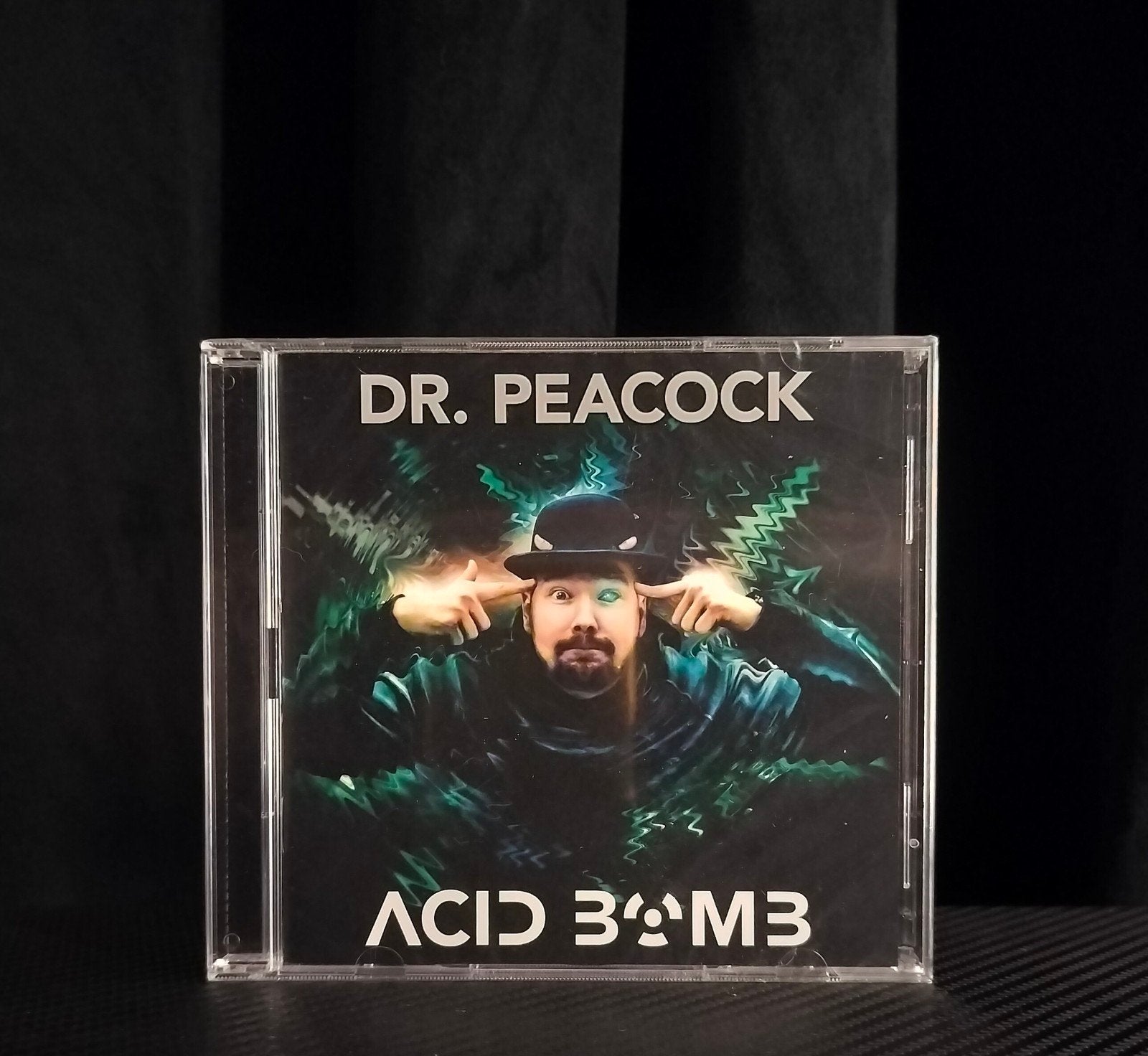 Dr. Peacock - Acid Bomb - CD - Nieuw, Ophalen of Verzenden, Nieuw in verpakking, Album, Inclusief boekje