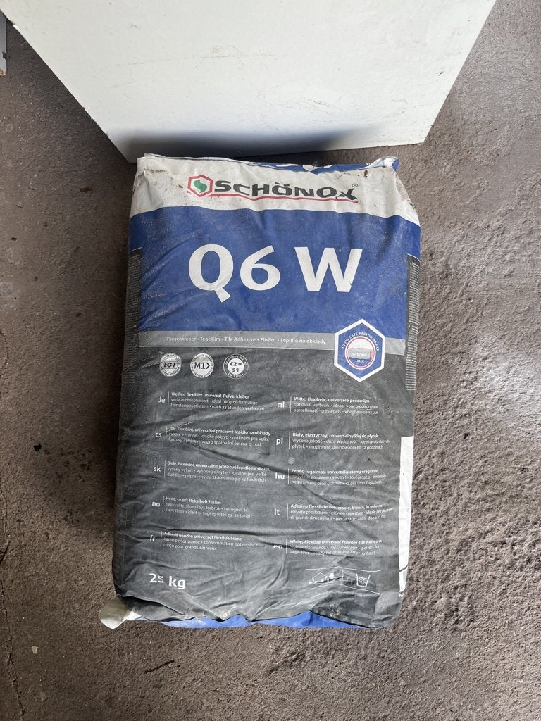Tegelpoederlijm - Schönox Q6 W - wit - ongeopende zak 25 kg, Ophalen, Overige materialen, Overige typen, Nieuw