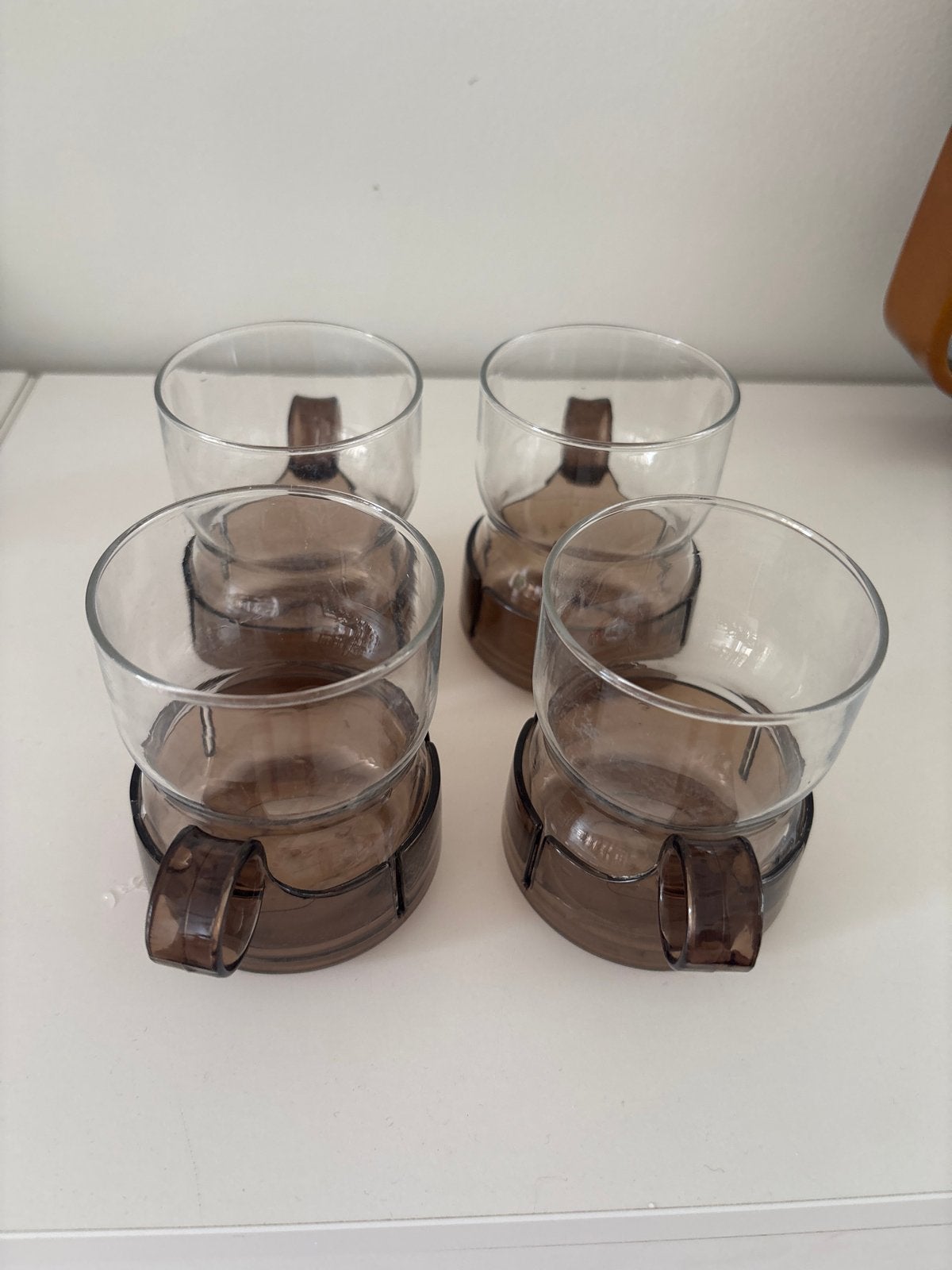 Melitta koffie- of theekopjes met oor, 4 stuks, Ophalen of Verzenden, Glas, Overige typen, Gebruikt