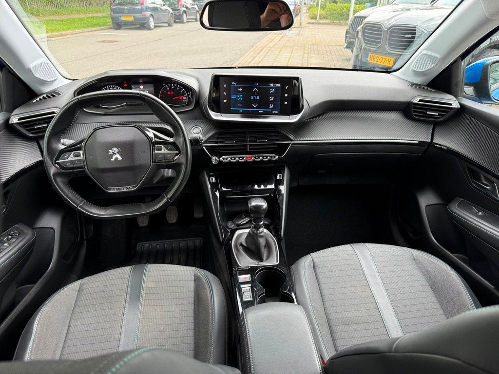 Peugeot 208 1.2 PureTech Allure 100PK, Navi Dealer auto, Auto's, Voorwielaandrijving, 101 pk, Gebruikt, Blauw