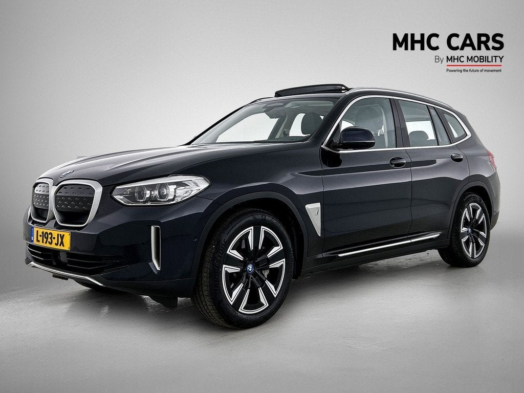 BMW iX3 Executive 80 kWh (bj 2021, automaat), Auto's, BMW, Automaat, Gebruikt, Leder en Stof, Zwart