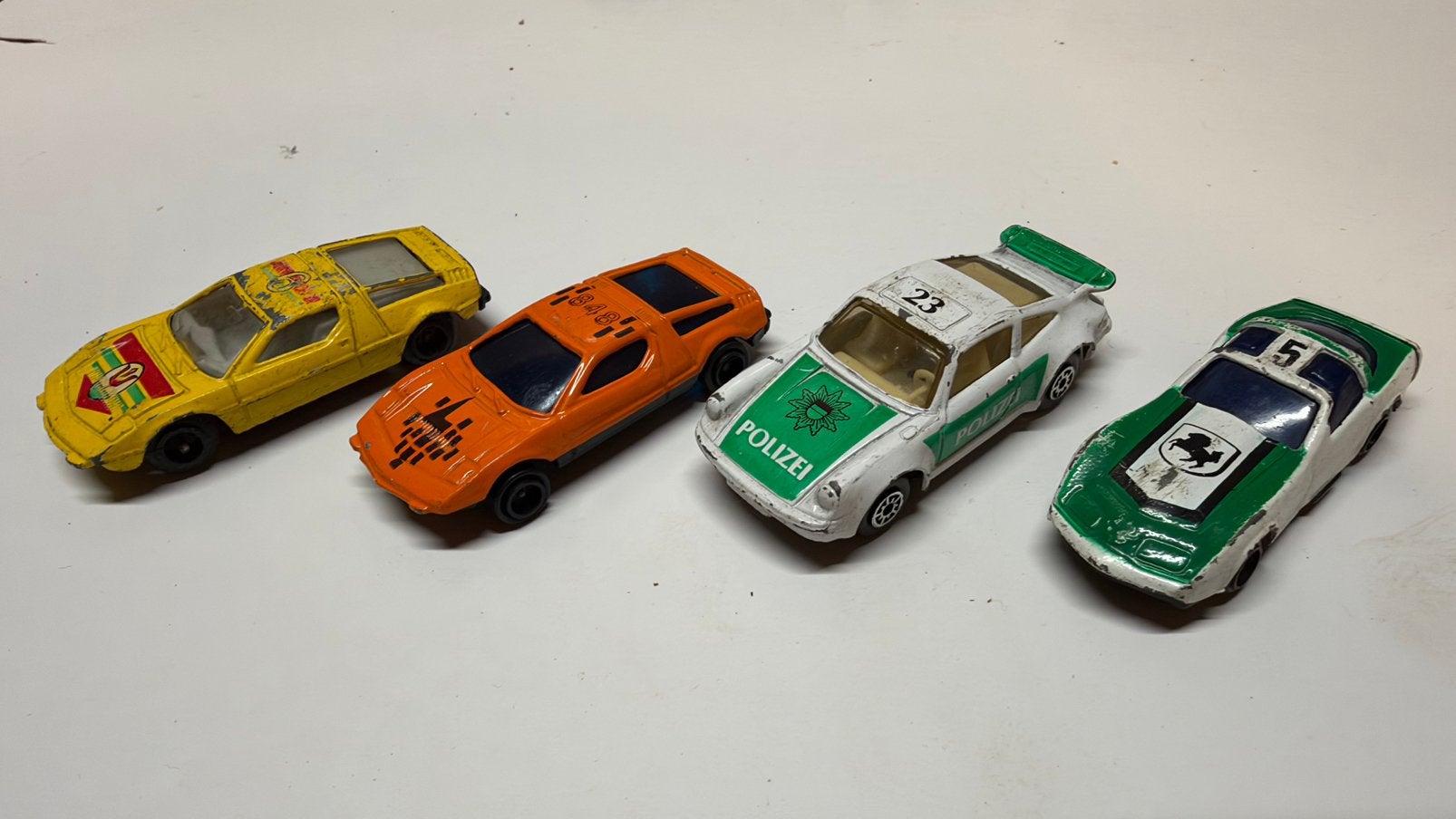 4 vintage speelgoedauto’s Porsche Polizei Ferrari raceauto’s, Ophalen of Verzenden