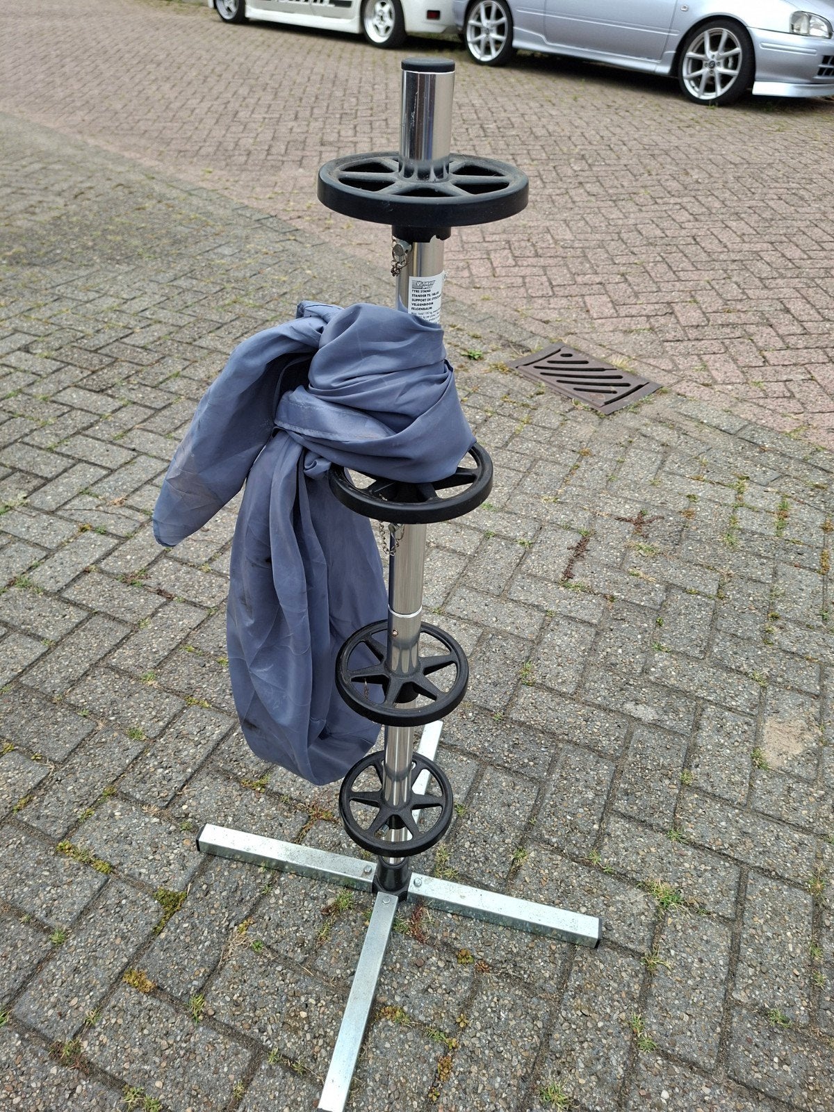 statief voor auto banden met hoes, Ophalen