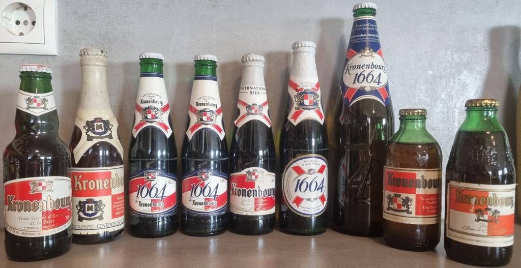 9x oude en vintage Kronenbourg '70's–'02 - import en meer, Verzamelen, Biermerken, Zo goed als nieuw, Glas of Glazen, Overige merken