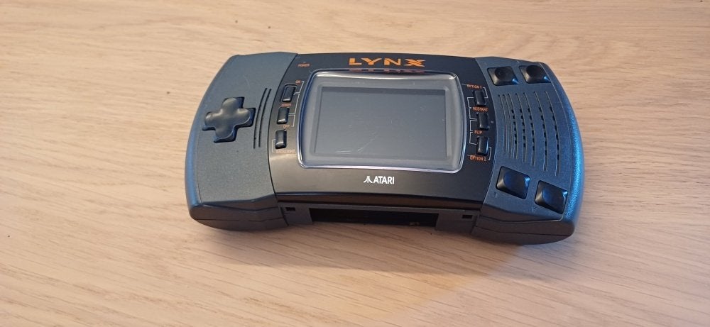Atari Lynx II Handheld Console + Spel A.P.B. + Adapter, Spelcomputers en Games, Spelcomputers | Atari, Ophalen of Verzenden, Zonder controller