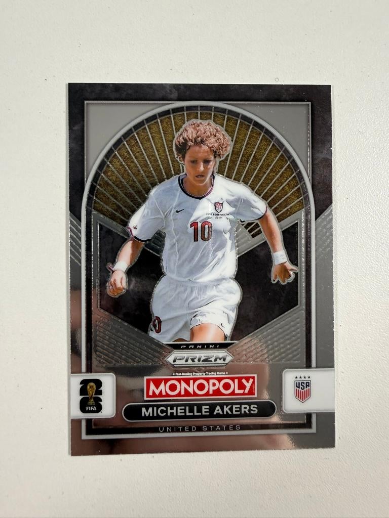 90 Michelle Akers Prizm Monopoly World Cup 2026, Ophalen of Verzenden, Nieuw, Buitenlandse clubs, Poster, Plaatje of Sticker