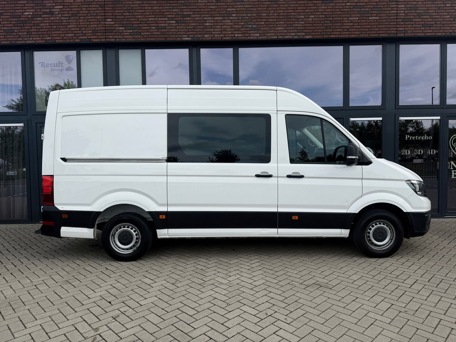 Volkswagen Crafter 35 2.0 TDI L3H3,Dubbel cabine 7 persoons,, Dealer onderhouden, Stof, Gebruikt, Zwart