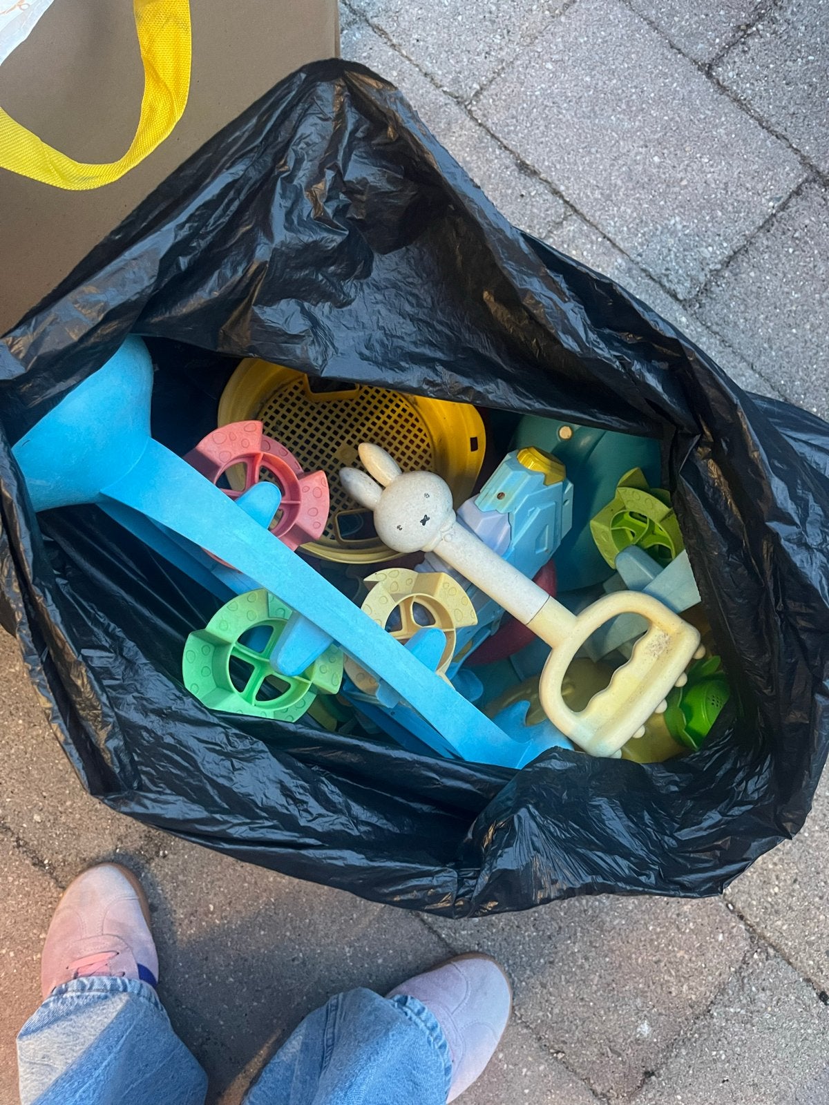 Zak Zandbakspeelgoed, Ophalen
