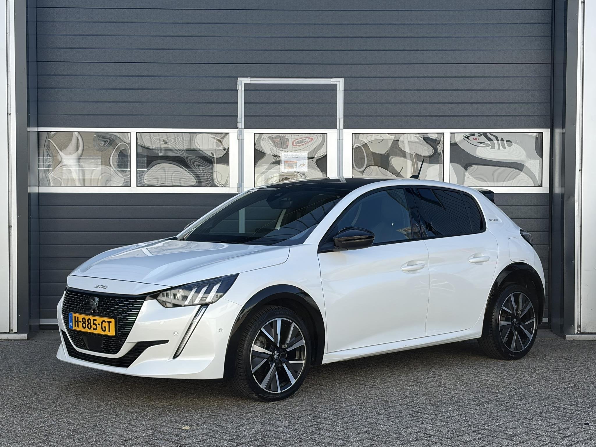 Peugeot 208 1.2 PureTech GT Line | Pano | Keyless | Cruise |, Auto's, 101 pk, Gebruikt, Euro 6, Leder en Stof