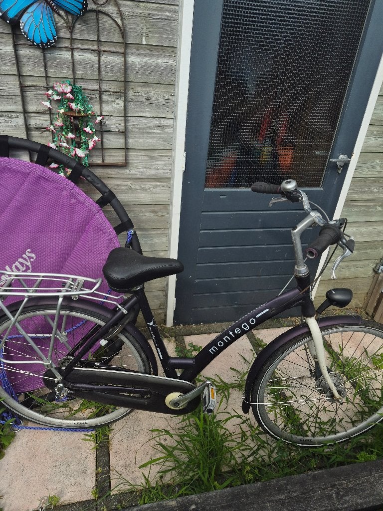 Paarse Montego fiets 28 inch, Fietsen en Brommers, Fietsen | Dames | Damesfietsen, Minder dan 47 cm, Ophalen, Gebruikt, Overige merken