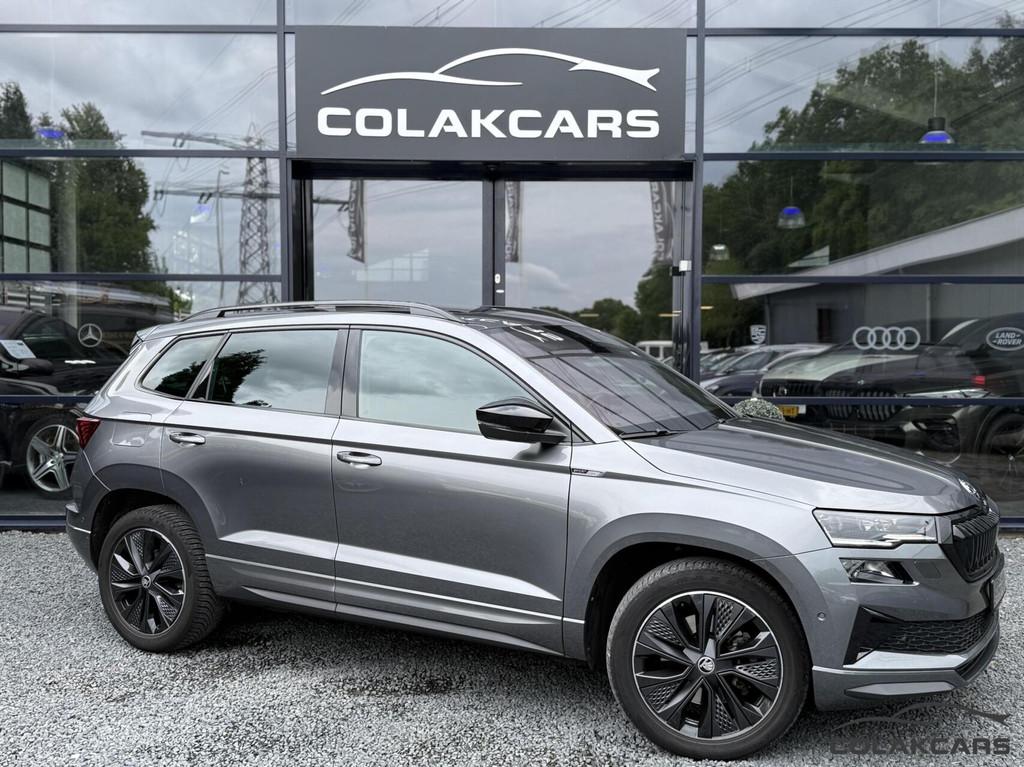 Skoda Karoq 2.0 TSI 4x4 Sportline Business, Auto's, Skoda, Automaat, Gebruikt, Euro 6, Vierwielaandrijving