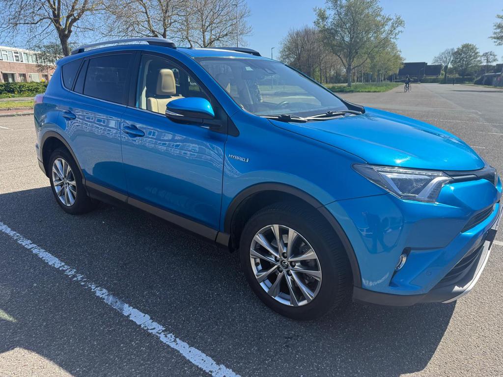 Toyota Rav4 2.5HYBRID 145KW AWD CVT 2016 2016 Blauw, Auto's, Automaat, 1650 kg, Leder, 155 pk